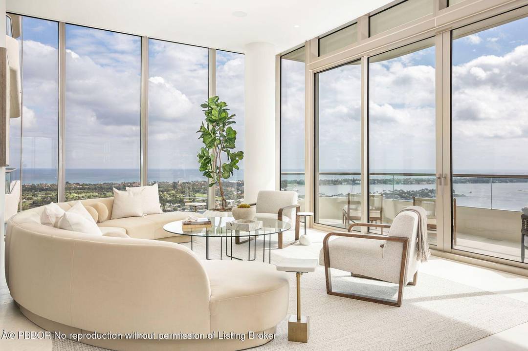 Perched high above S Flagler Drive, waterfront Penthouse G at La Clara lives like a house in the sky offering uninterrupted views of the Atlantic Ocean, Palm Beach Island, Intracoastal, ...
