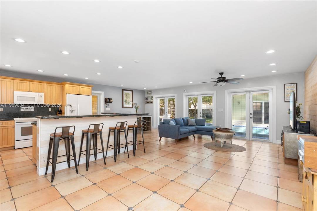 Welcome to this beautifully designed 3 bedroom, 2 bath pool home that blends comfort with effortless entertaining.