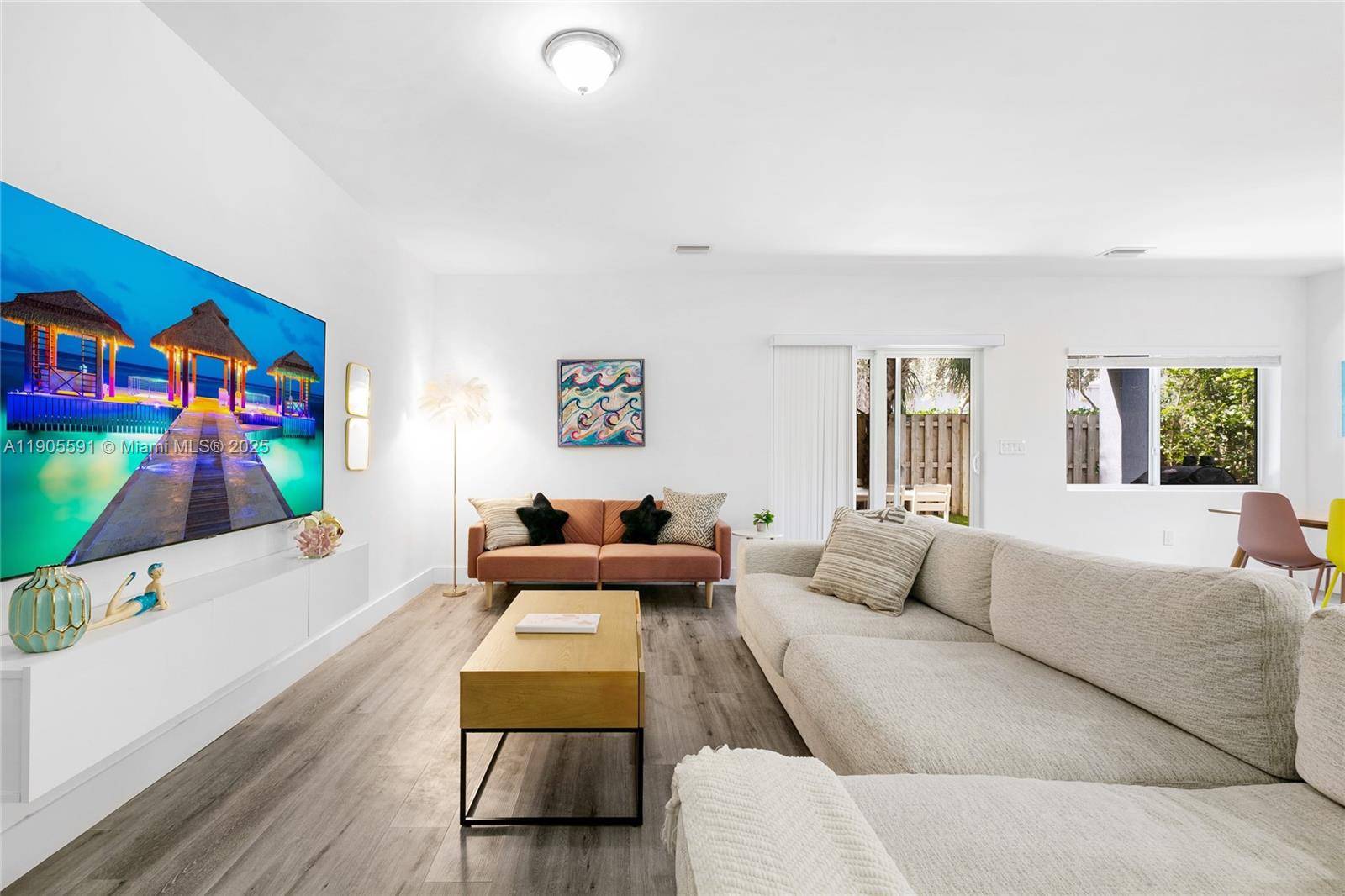 Welcome Home ! This Spectacular 3 Bedroom 3 Full Bathrooms each bedroom with its own ensuite and 1 Half Bath on the main floor.