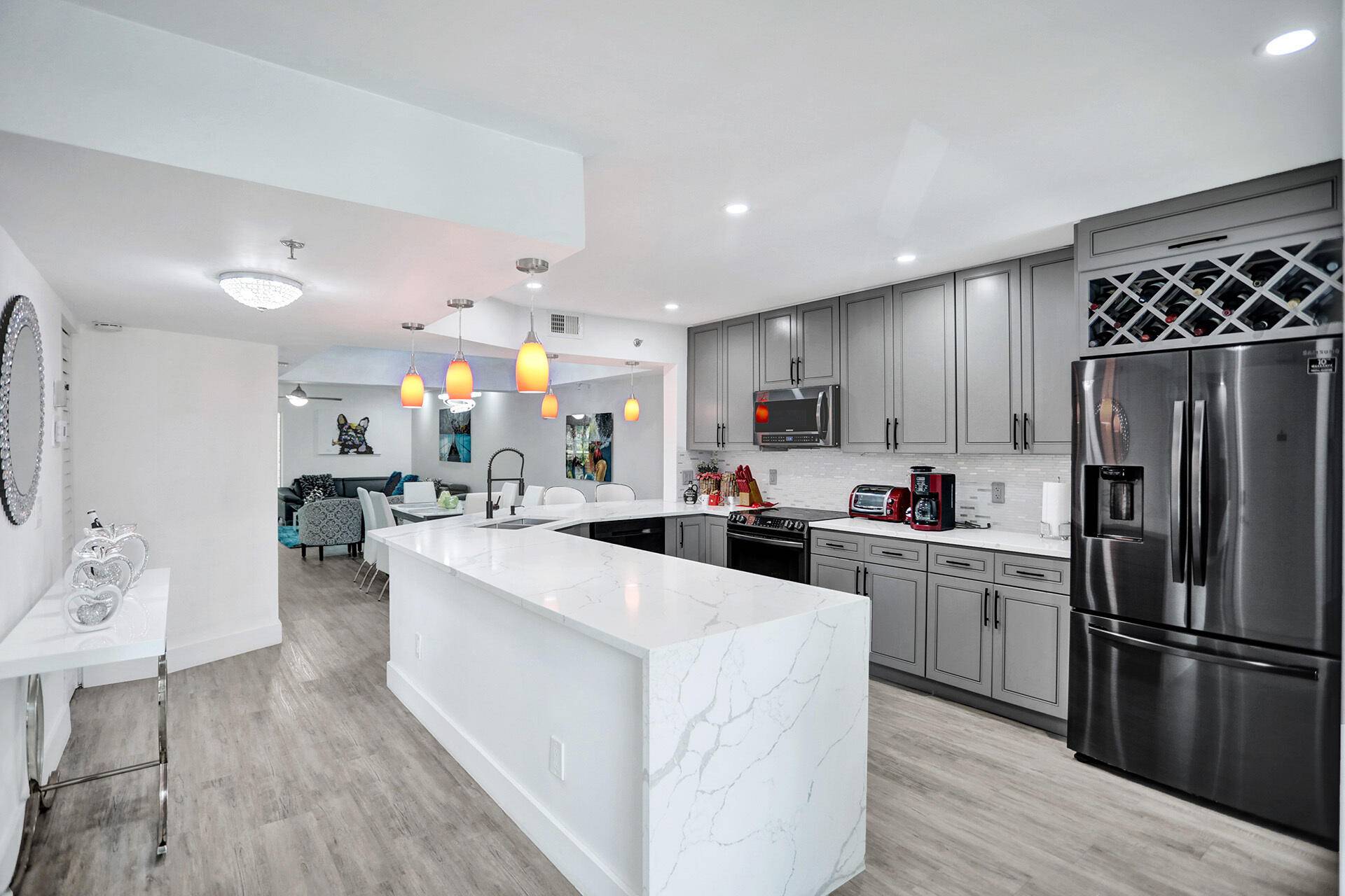Beautiful 2 2 in the patios of Boca Barwood with LED lights throughout and an open concept kitchen you won't find many others like this in the area.