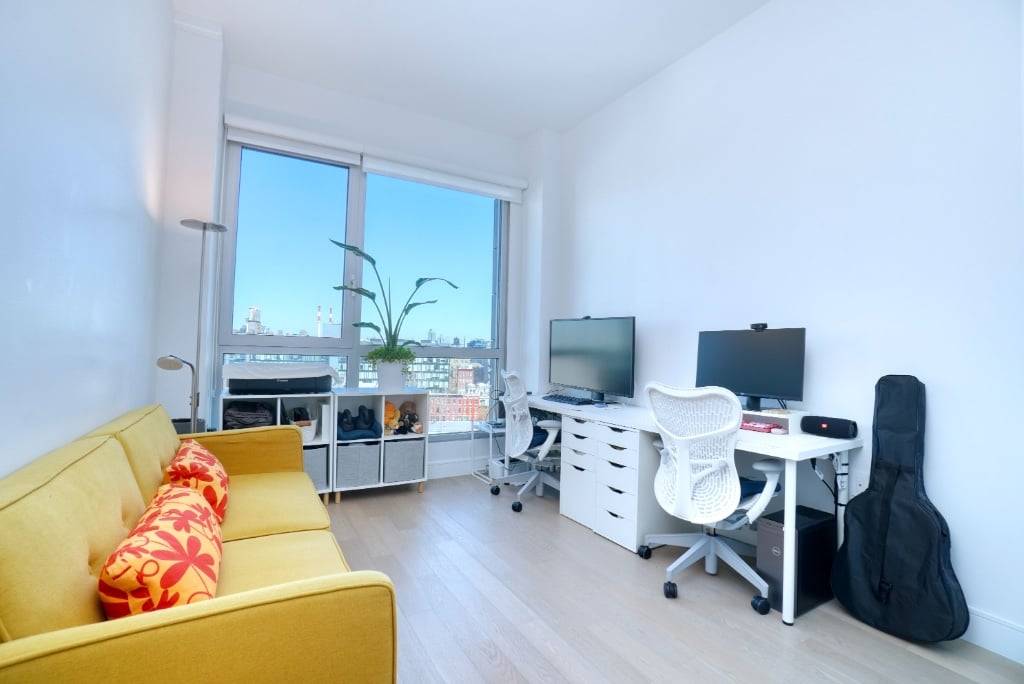 Bright and spacious 2 bedroom, 2 bathroom apartment at Prime LIC with a private balcony and stunning Manhattan skyline views.