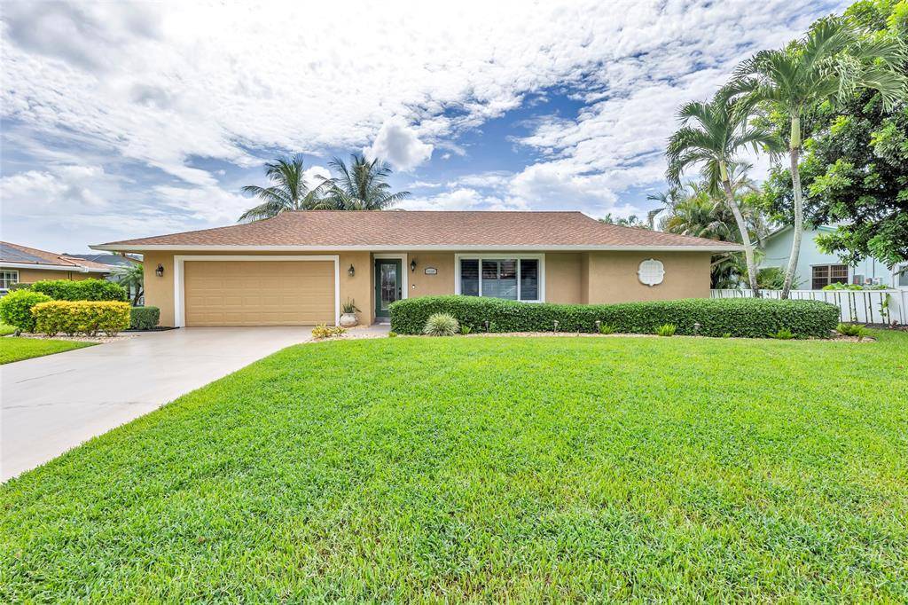 Move in ready home featuring a brand new A C, hot water heater, and freshly updated landscaping.