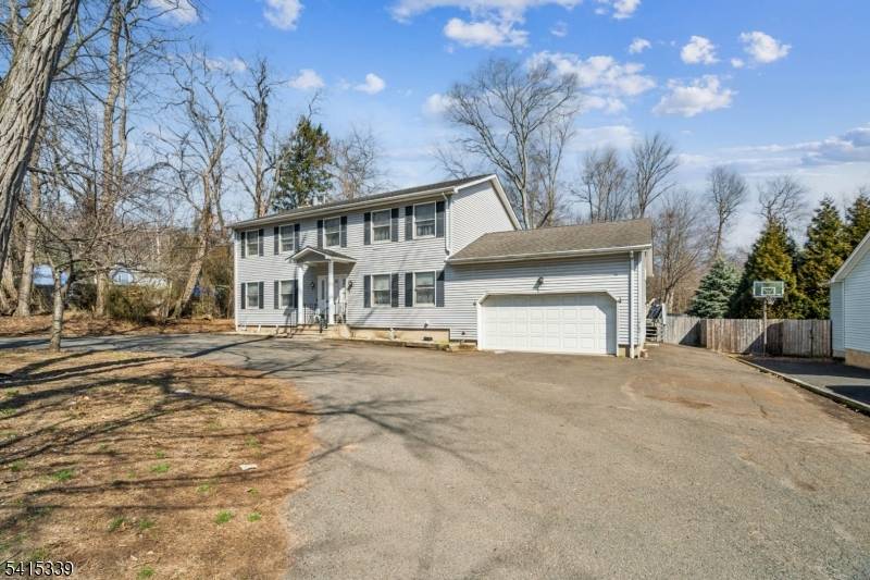 Welcome to 110 Edgewood Ave in desirable Green Brook a spacious and inviting home with endless potential !