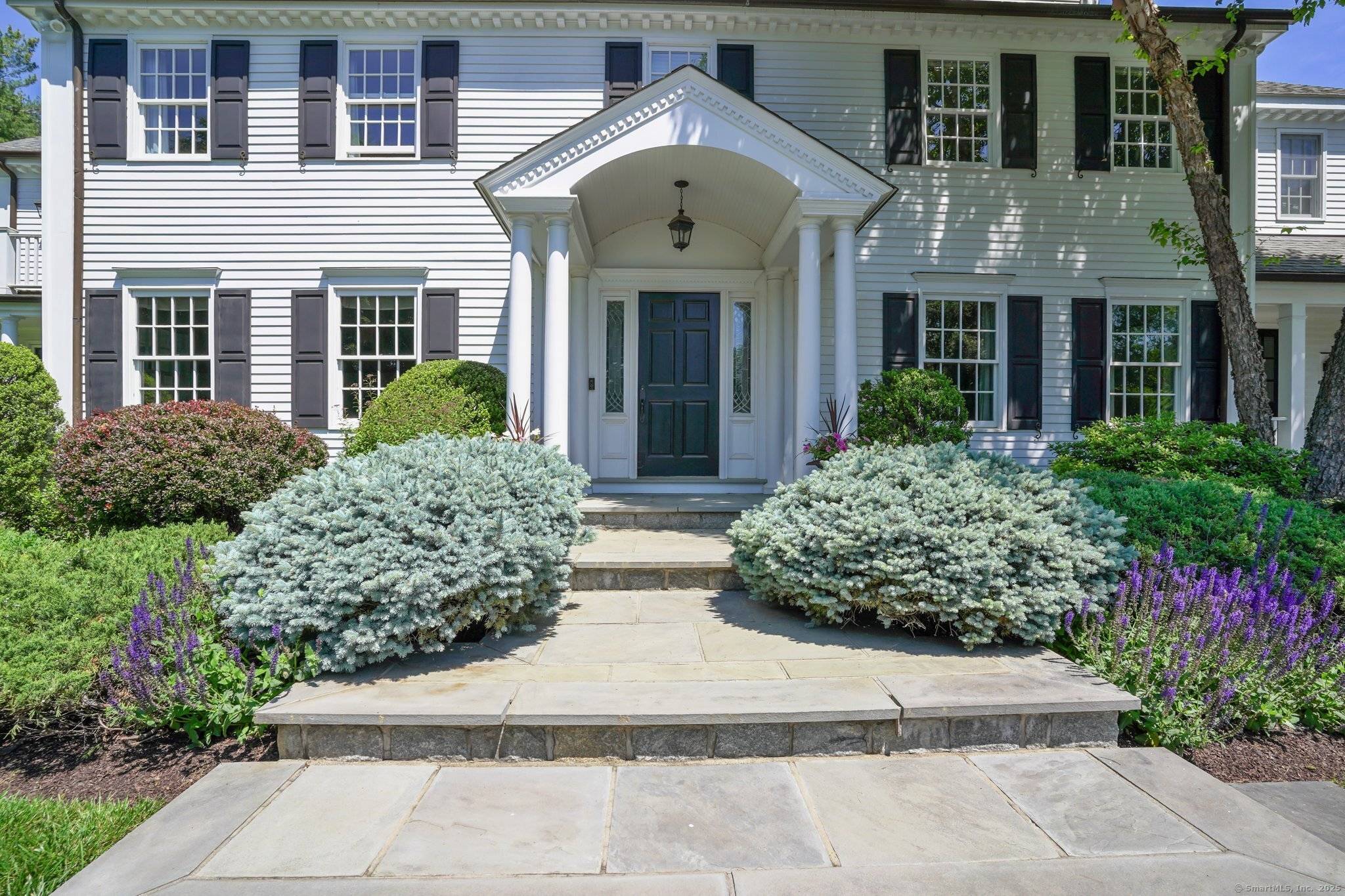 Welcome to 152 Long Lots Perfectly sited on two flat acres in the highly sought after Hoyt Farm neighborhood.