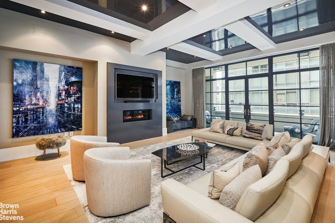 It's a WOW ! From the minute you step off the elevator onto the semi private landing and enter this dazzling, expansive, triple mint, 2426 SF, three bedroom, 3.