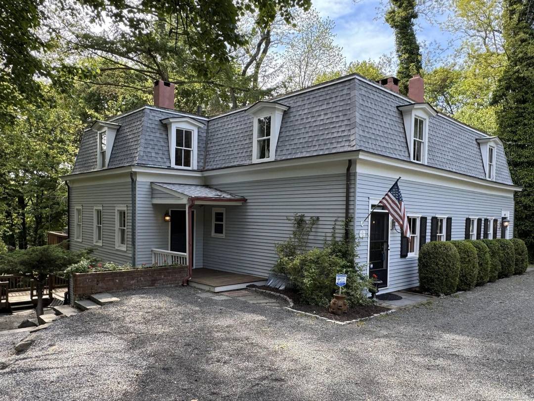 PRICE ADJUSTMENT. A Rare Darien Gem and opportunity to own this historic Federal Colonial 2 family home, one of Darien's few multi family properties.