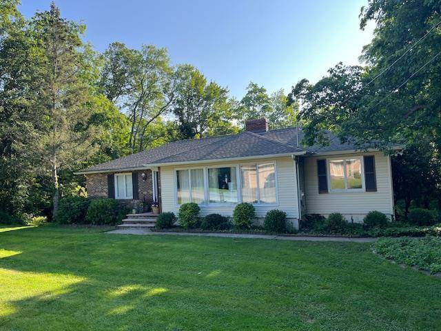 Welcome to this renovated ranch that sits on over an acre with privacy.