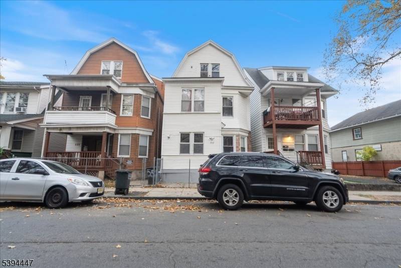 Discover this spacious two family home ideally situated for investors seeking a solid rental opportunity.