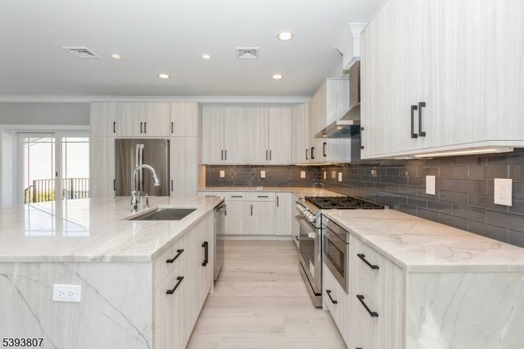 Step into modern elegance at 8 Gregory Road, a beautifully renovated 3 bedroom, 3.