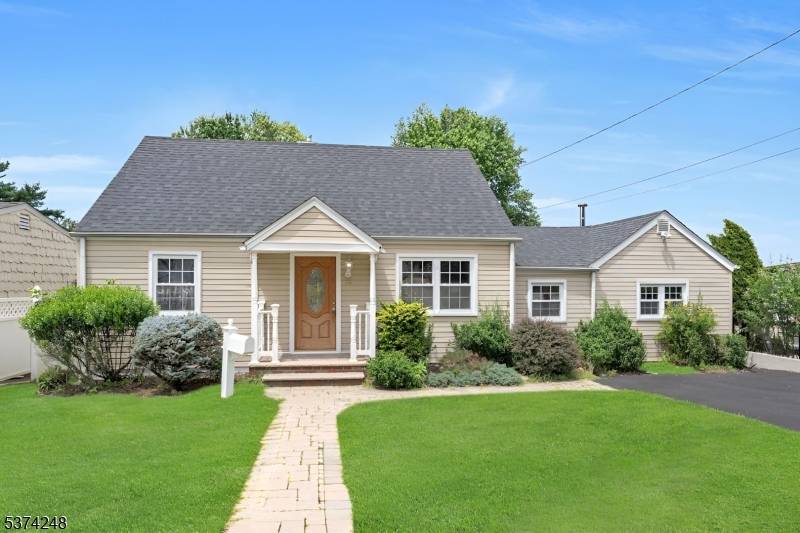 Welcome to this beautifully maintained 3 bedroom Cape, where charm meets comfort in every corner.
