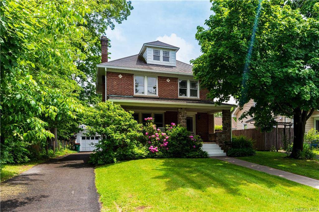 Discover the charm and elegance of this stunning period brick home, offering 4 bedrooms and 1.