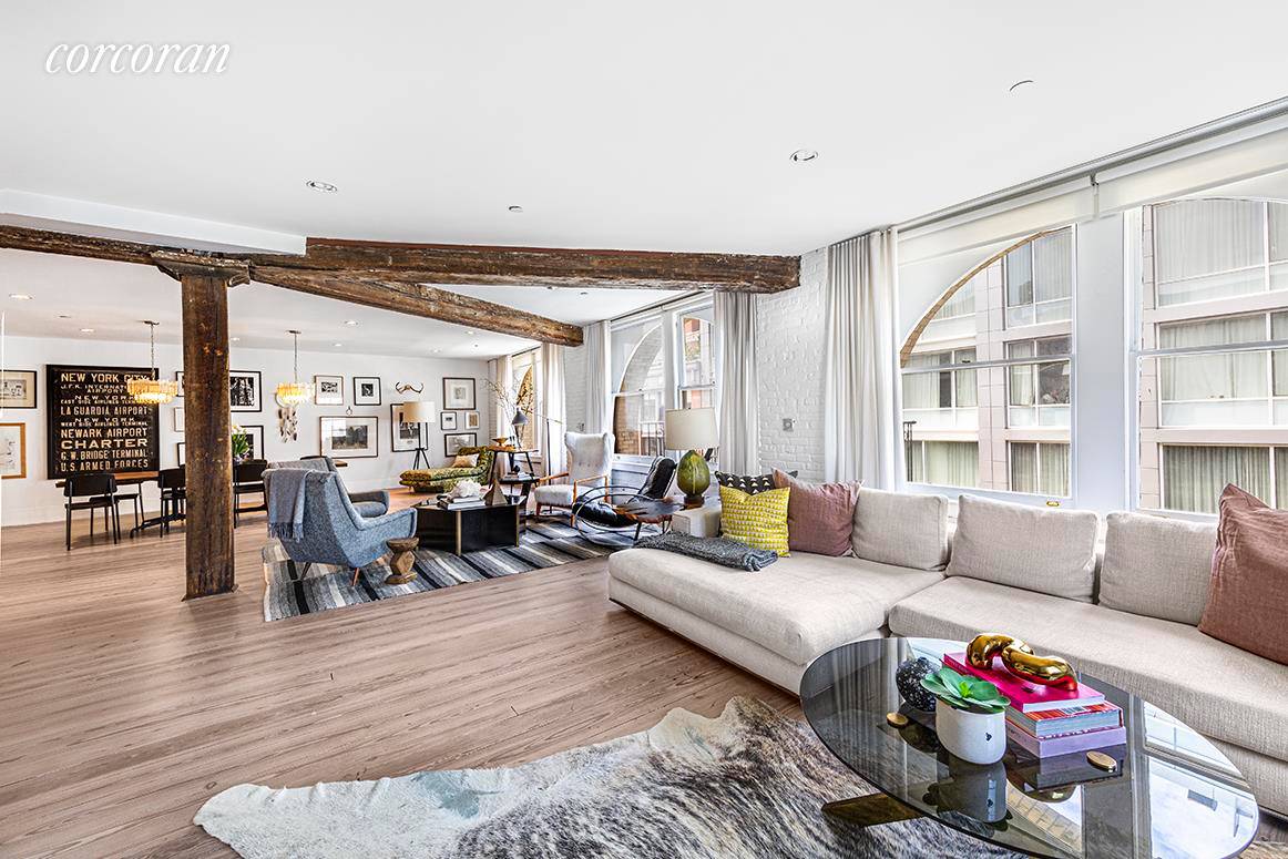 Modern luxury meets pre war charm in this meticulously renovated authentic SoHo loft that epitomizes the true essence of downtown living.