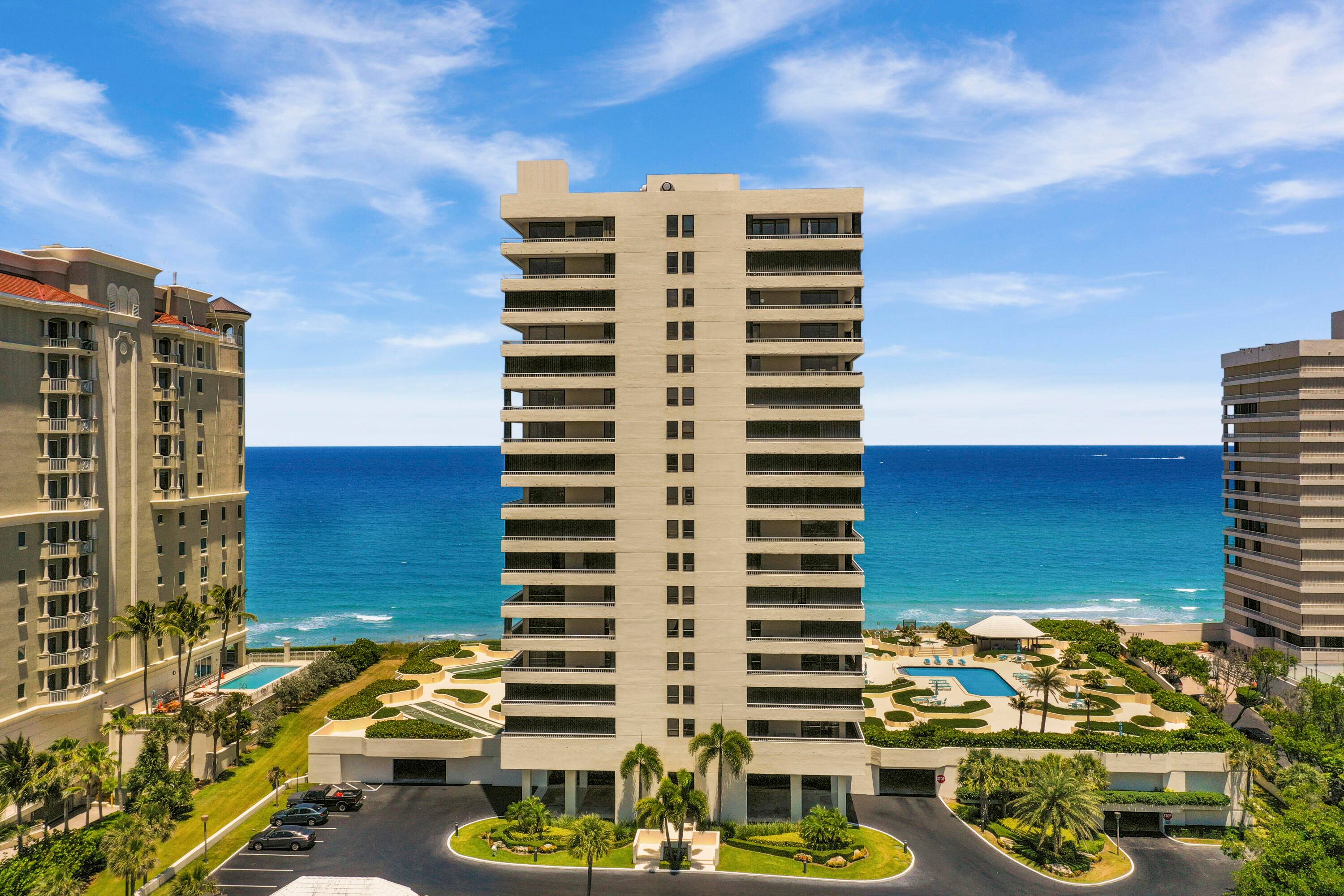 AMAZING Value in this corner unit oceanfront condo with 2 walls of floor to ceiling windows overlooking the ocean and intracoastal.