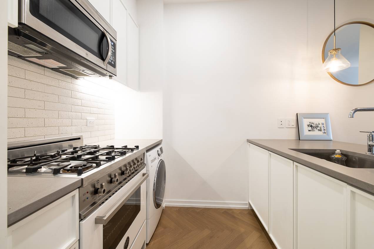 The interior of the loft like condos at the Austin Nichols House perfectly blend the timeless historic qualities of the residence with a modern twist.