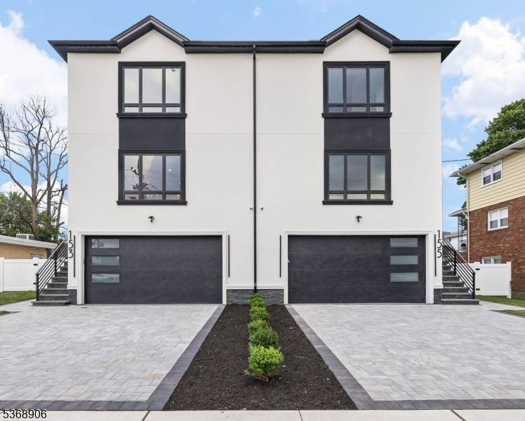 Welcome to this stunning new construction duplex, offering the perfect blend of modern comfort and stylish design.