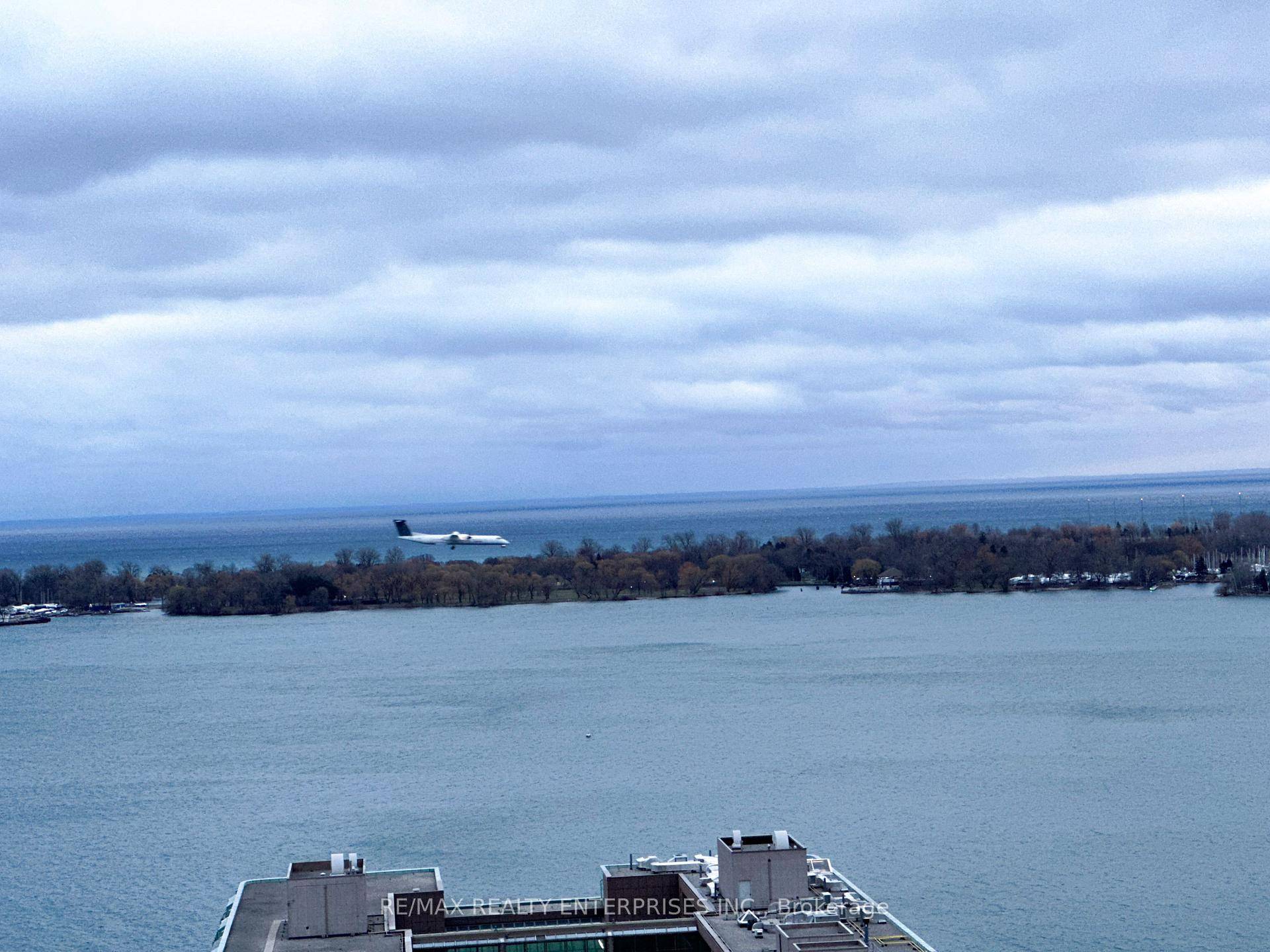 Stunning Lake Ontario Direct Waterfront Views with South Exposure Feel the sunshine as it lightens the whole unit enjoy an amazing solarium work space and or kitchen area to capture ...