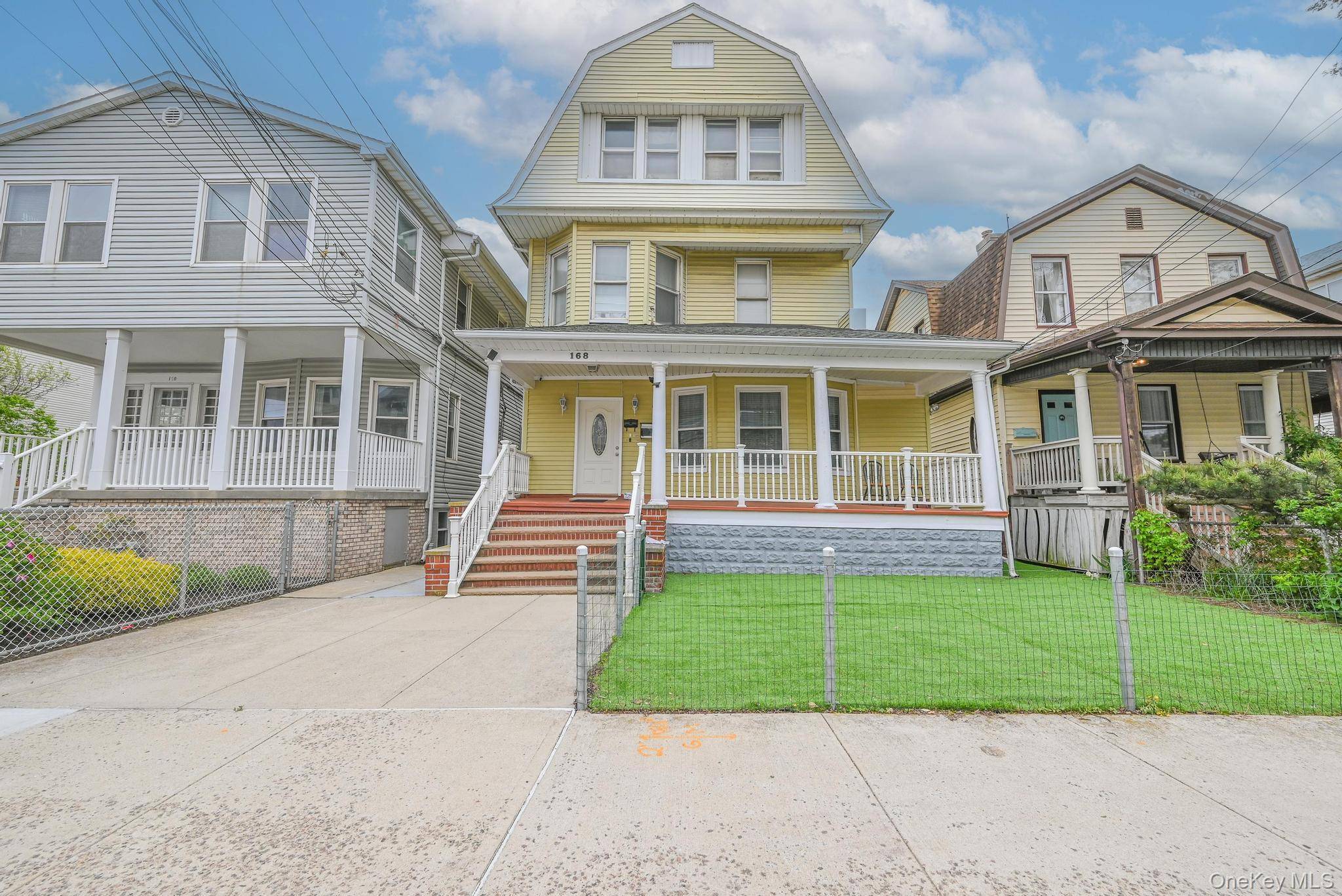Step into timeless elegance with this grand Victorian home, legally configured as a 3 family residence and brimming with historic character.