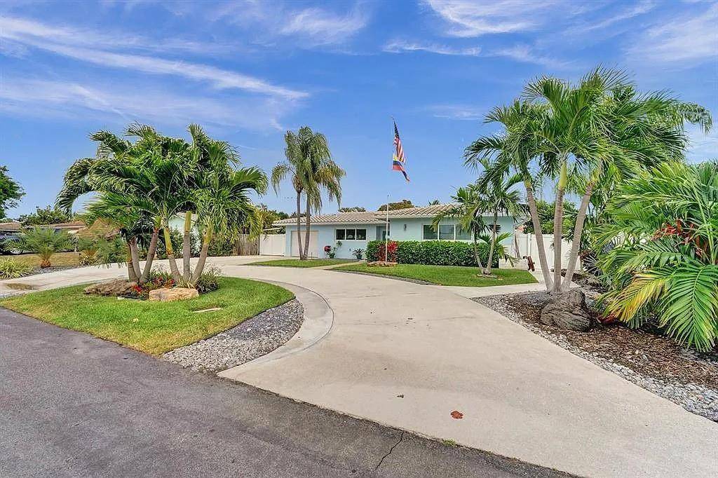 FULLY FURNISHED retreat in East Pompano Beach this stunning 3 bedroom 2 bathroom home garage conversion includes a large shed for storage.