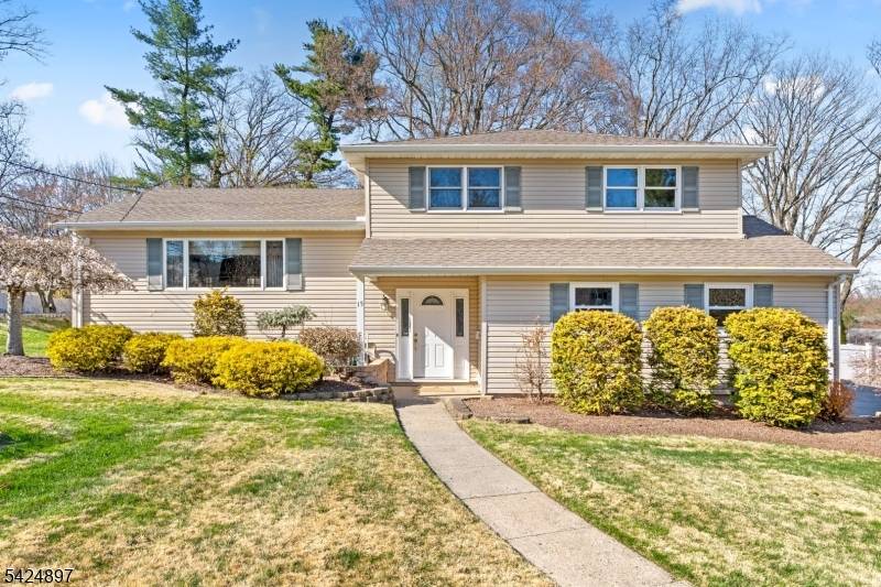 Welcome to this meticulously maintained and beautifully appointed home in a highly desirable section of Wayne.