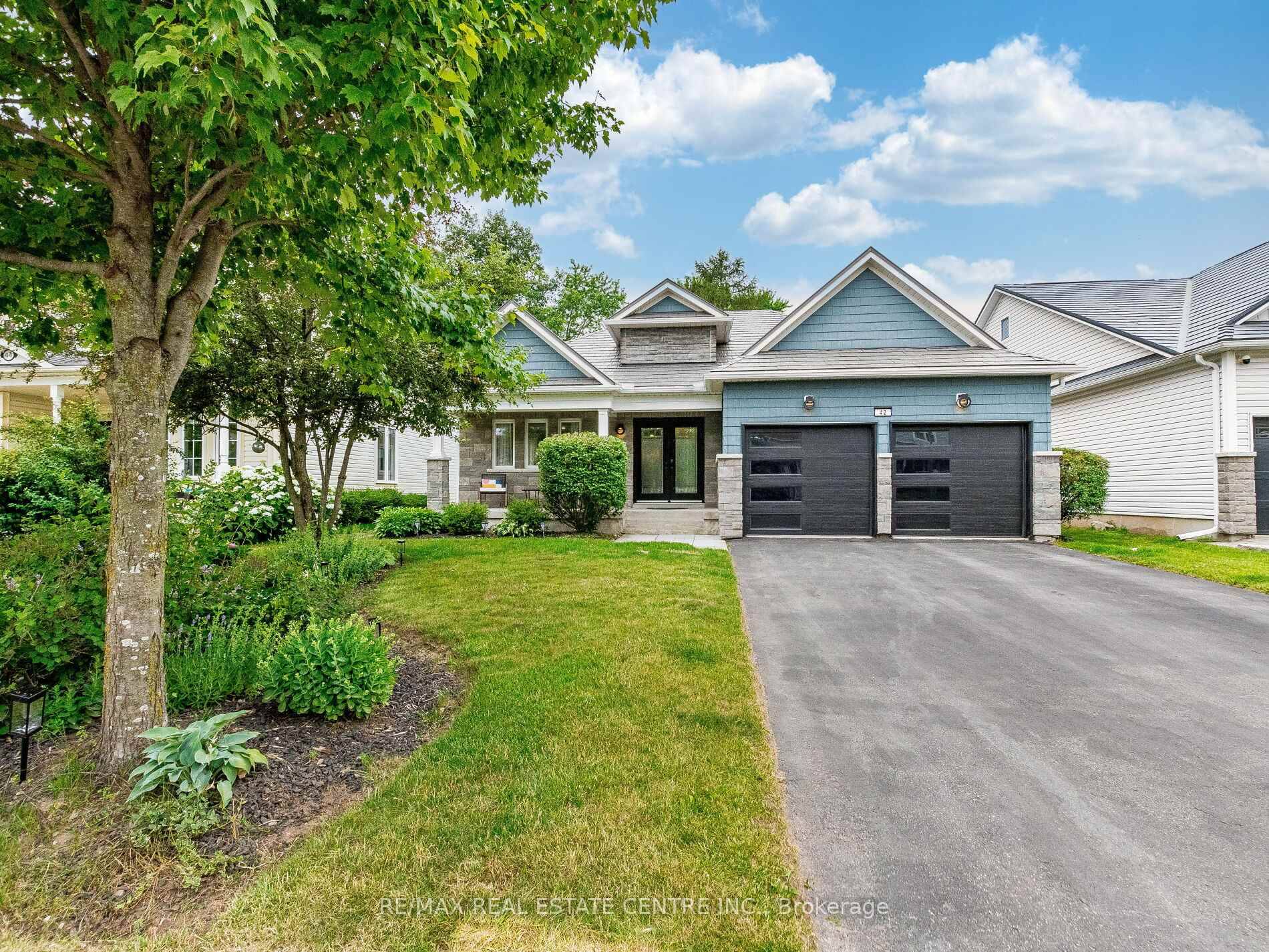 Nestled on a quiet family friendly street you'll immediately be impressed with the gorgeous exterior featuring many upgrades including metal roof, double door entry, shaker shingles, stone fac ade, lighting, ...