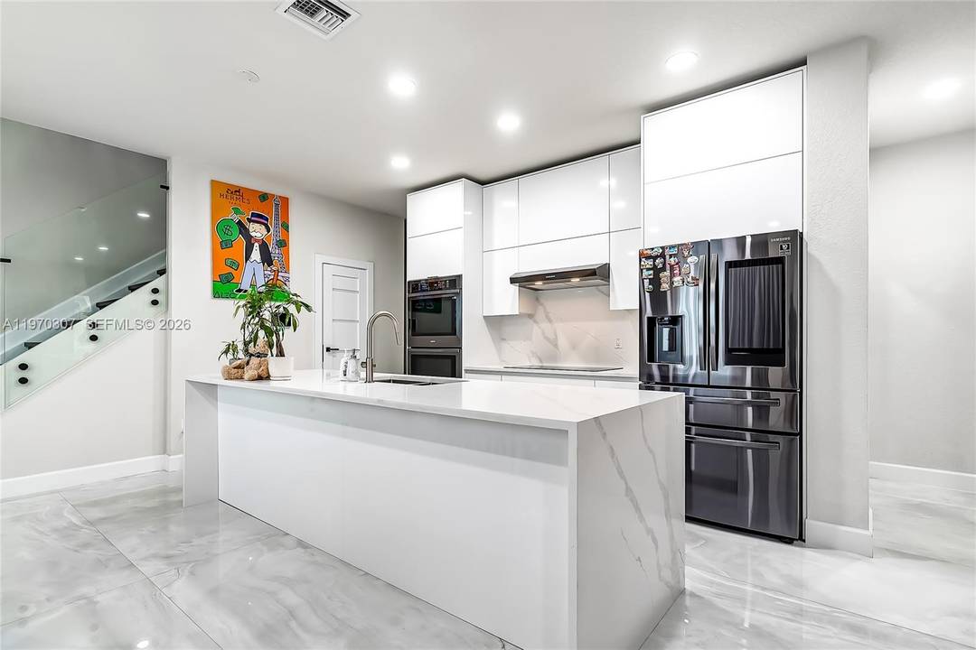 Stunning, fully upgraded residence offering 4 bedrooms den and 3 bathrooms with 2, 168 SF under A C, originally built in 2020 and extensively remodeled with high end finishes throughout.