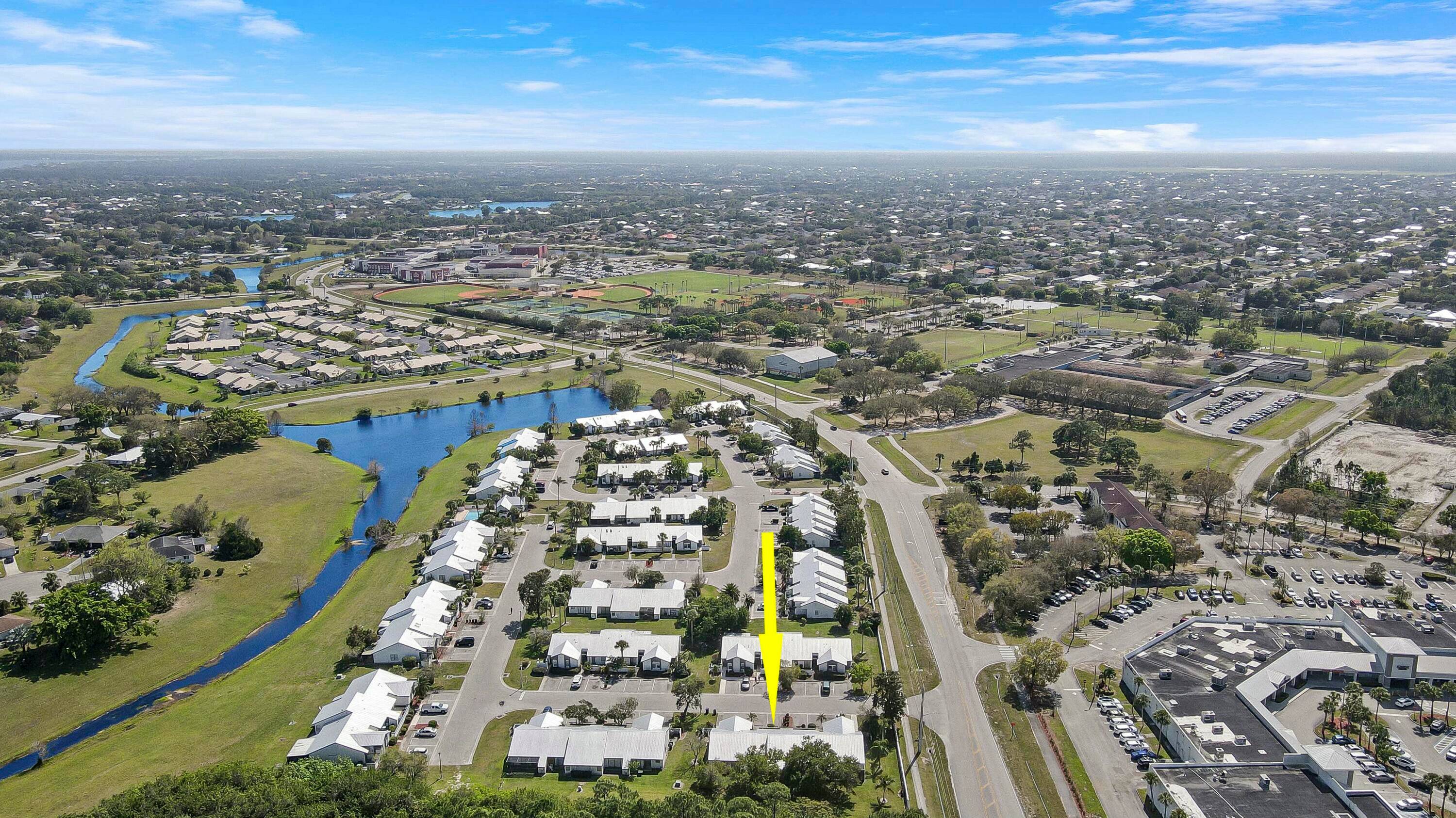 2 bed, 1 bath villa with brand new AC, and newer metal roof located in low HOA 124 mo.
