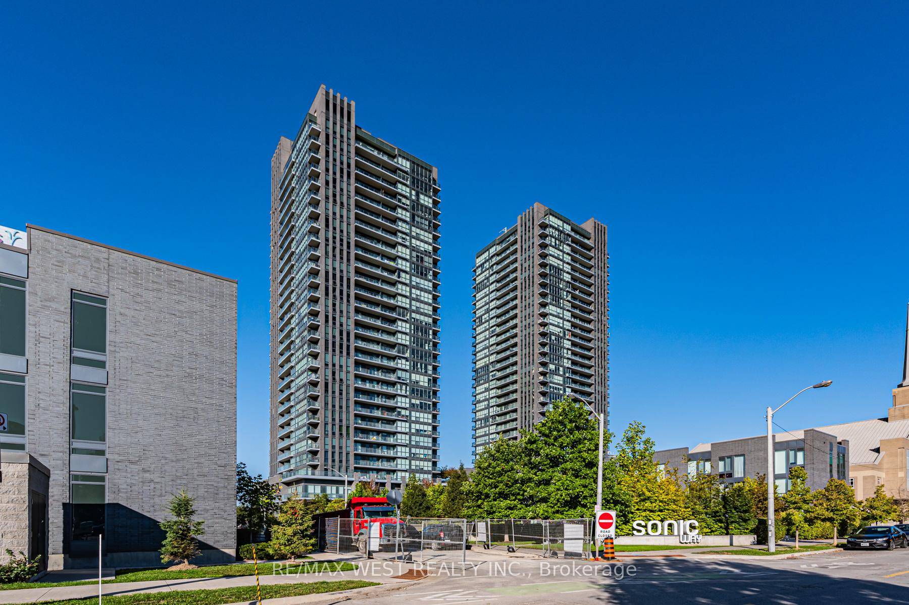 Spacious and Beautifully Bright One Bedroom Plus Den with Two Full Bathrooms at Sonic Condos, showcasing wide unobstructed city views and sleek modern finishes throughout.