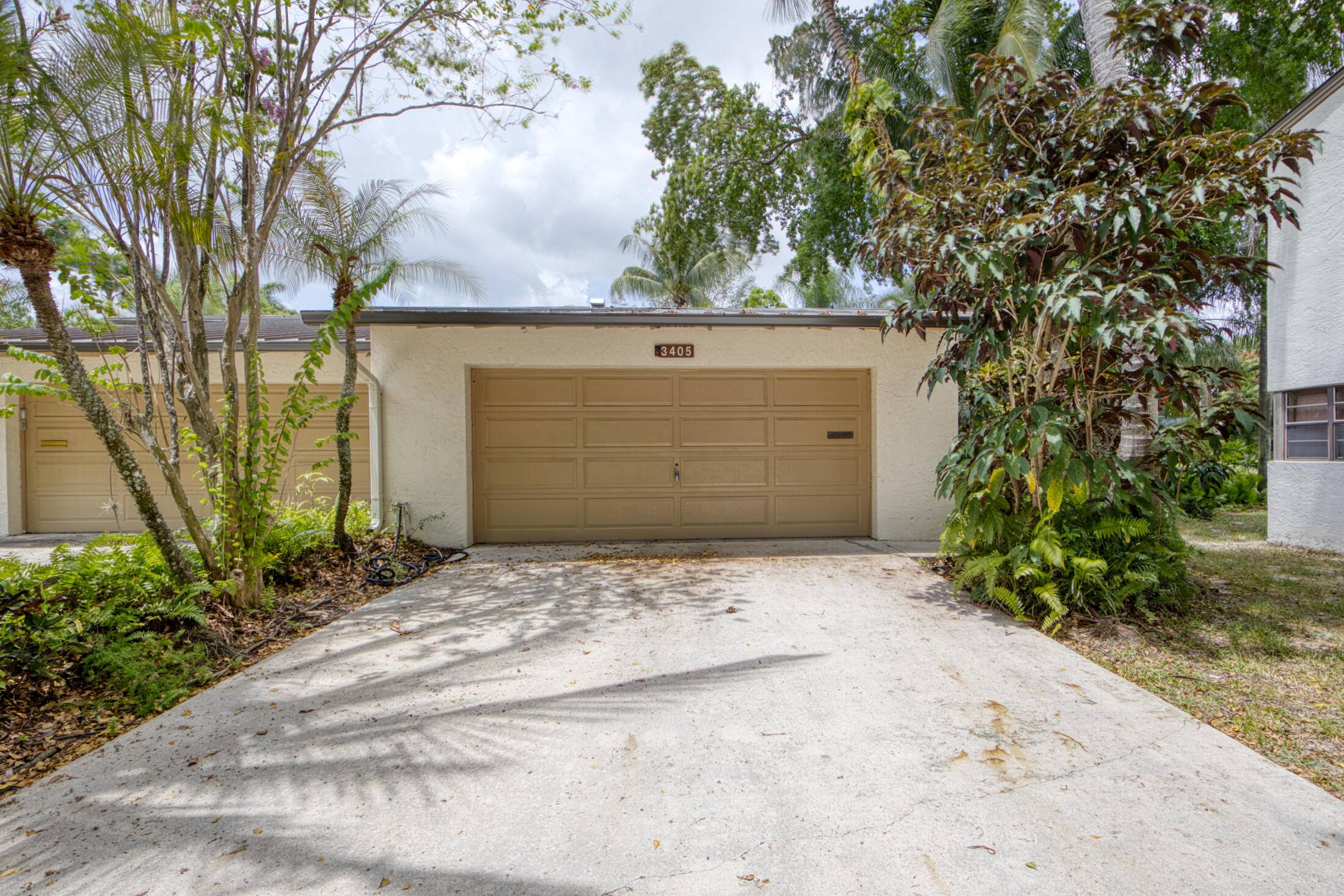 Tranquil and private with lush and tropical landscaping.