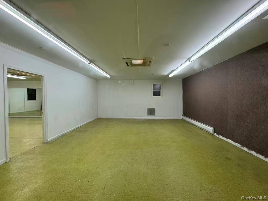 7, 101 SF lower level commercial unit offering strong income potential.