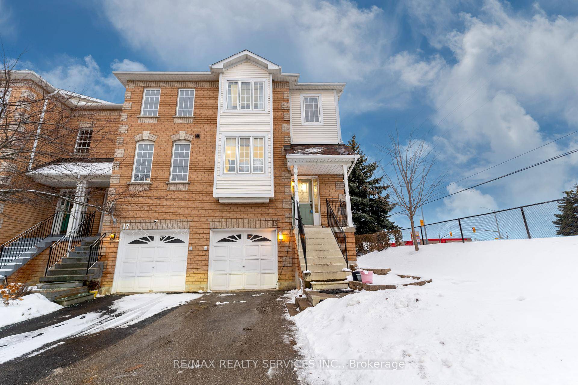 Welcome to This Stunning End Unit Townhouse !