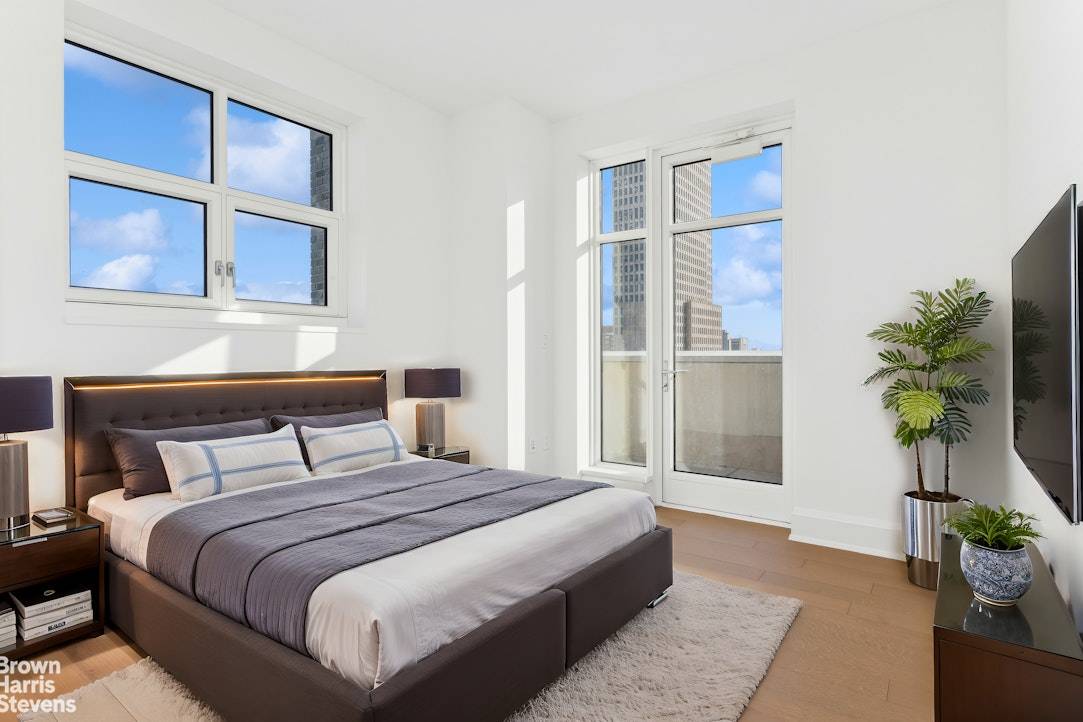 Residence 10E at Claremont Hall is a stunning corner home with two bedrooms, two bathrooms, and beautiful views of Riverside Park and the George Washington Bridge.