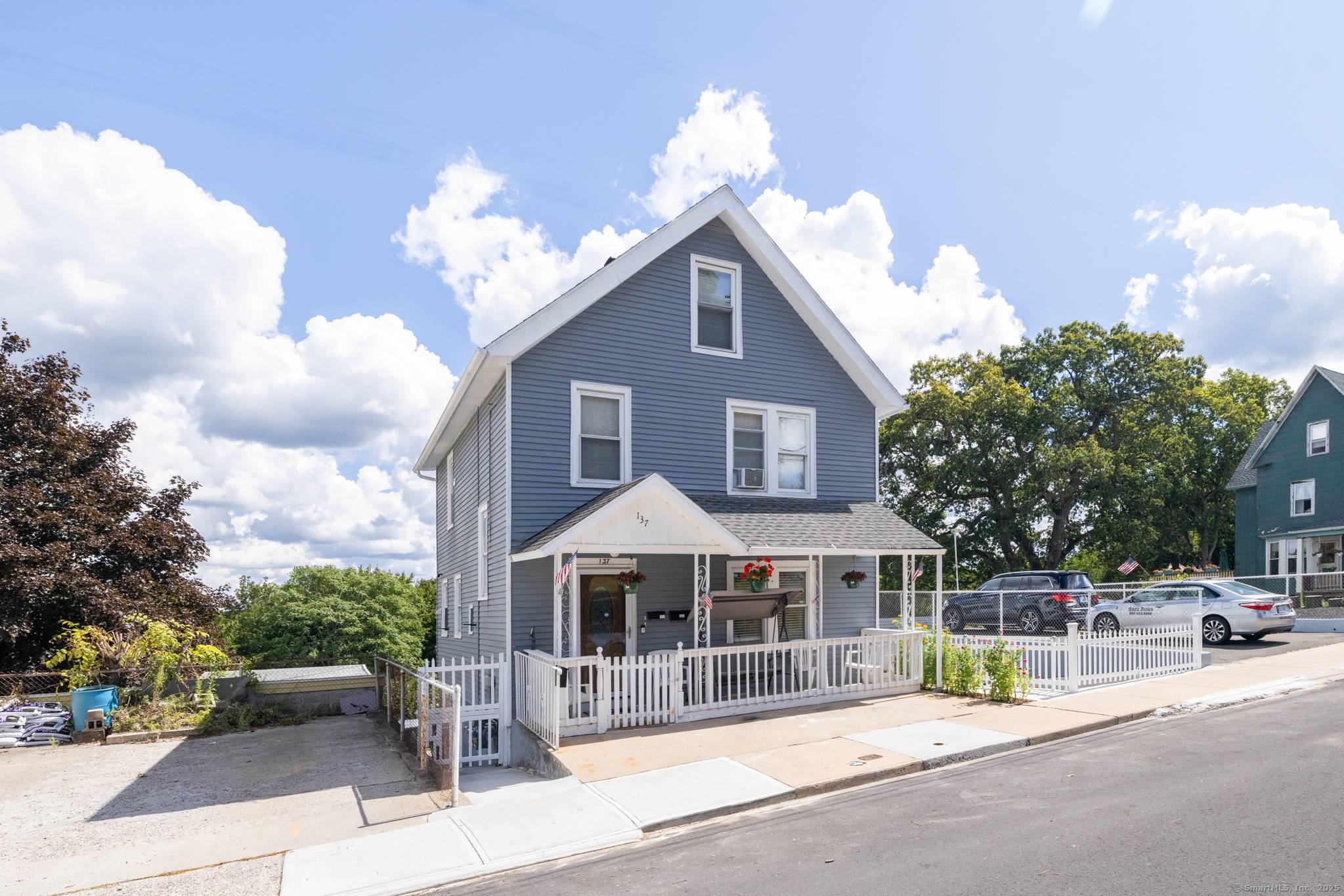 This fully renovated 2 family property features new kitchens and bathrooms, a newer roof, and a private in law apartment perfect for extended family or additional income.