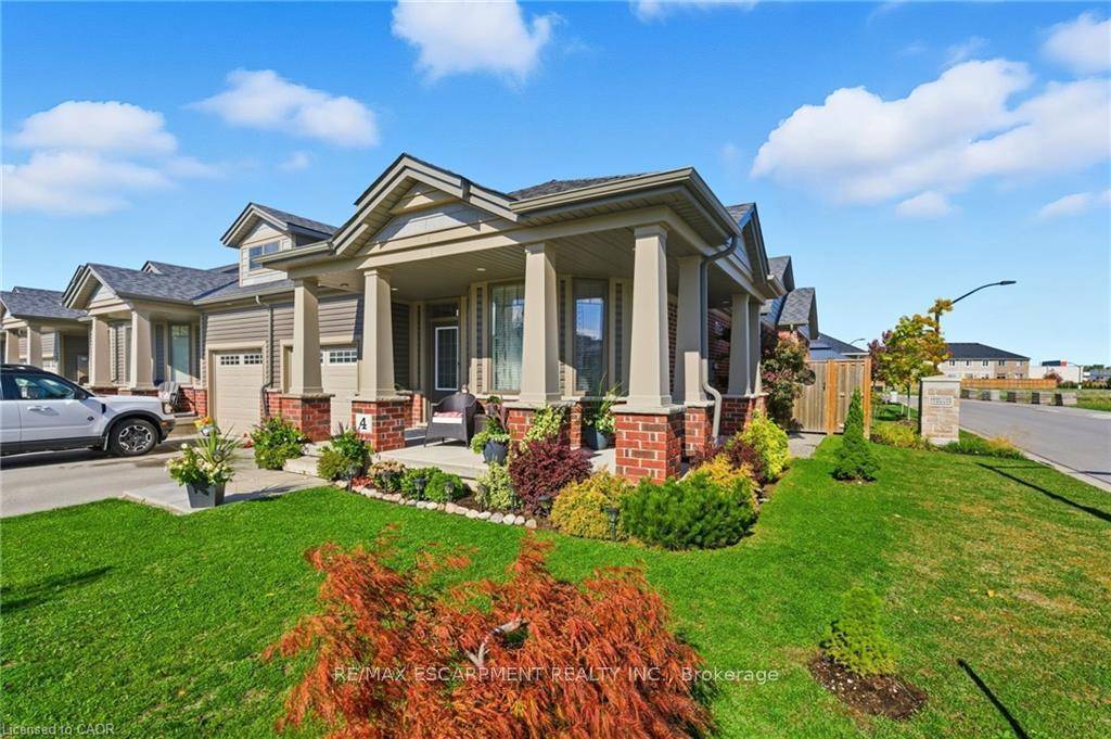 This freehold no condo fees bungalow townhome is located in the peaceful and exclusive community of Merritton Commons.
