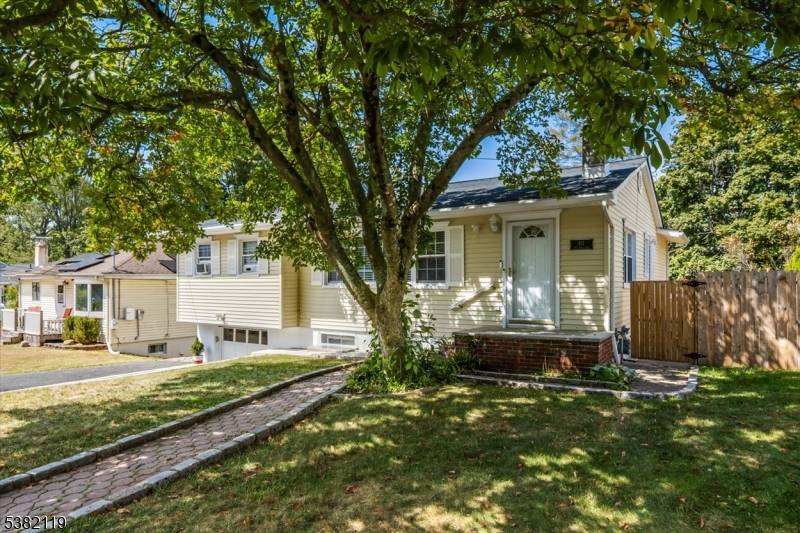 Welcome to this beautifully updated raised ranch located in the desirable Landing section of Roxbury, part of a vibrant lake community near Shore Hills Beach Club.