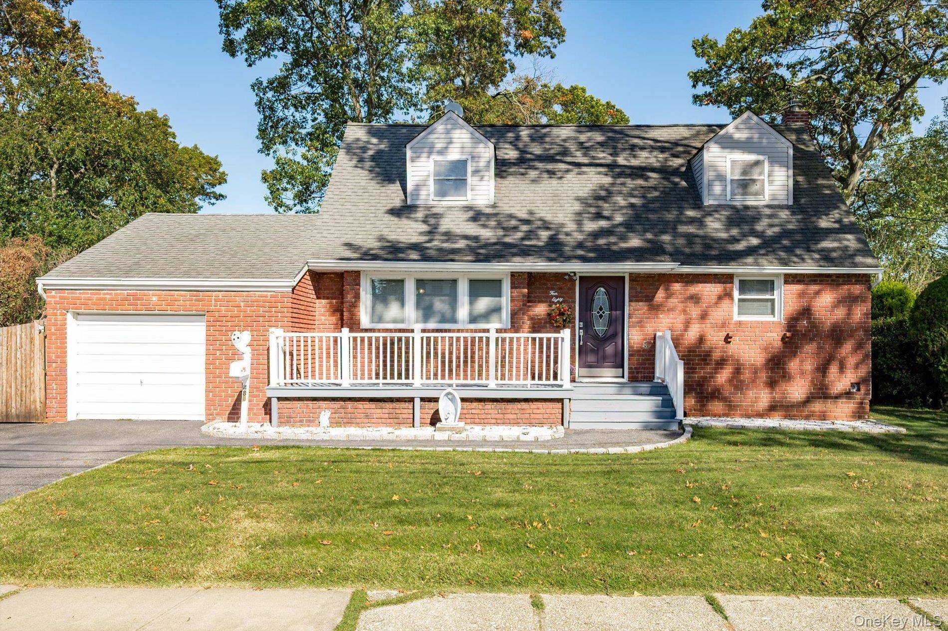 This Beautiful Large Expanded Cape In Lindenhurst School District.