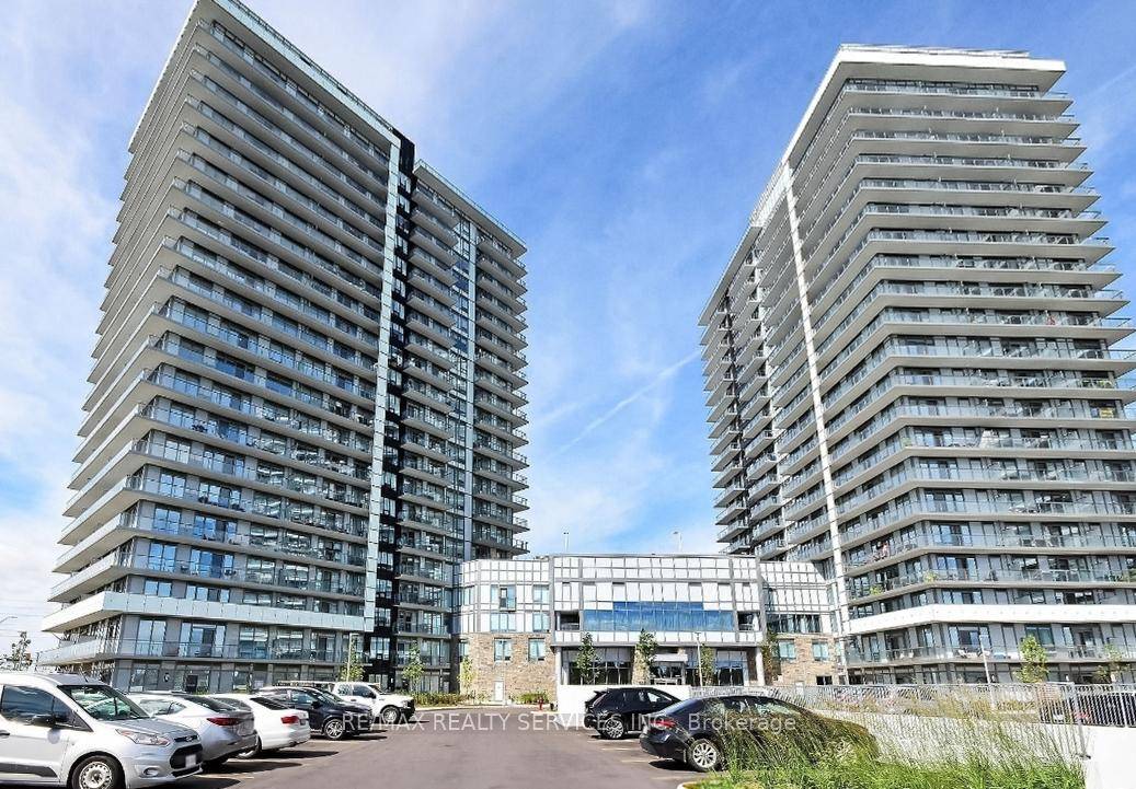 Welcome to this stunning 2 bedroom den, 2 bathroom condo offering a bright, open concept layout with nearly 9' smooth ceilings, wide plank laminate flooring, and contemporary finishes throughout.