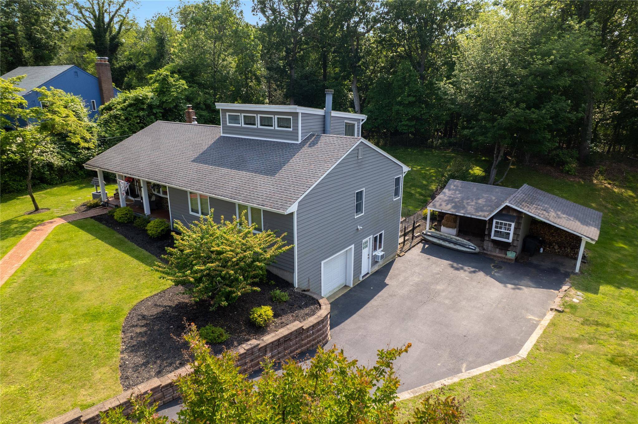 Welcome to this beautifully maintained and thoughtfully updated Cape style home located in the sought after Shore Ridge Hills community of Shoreham.