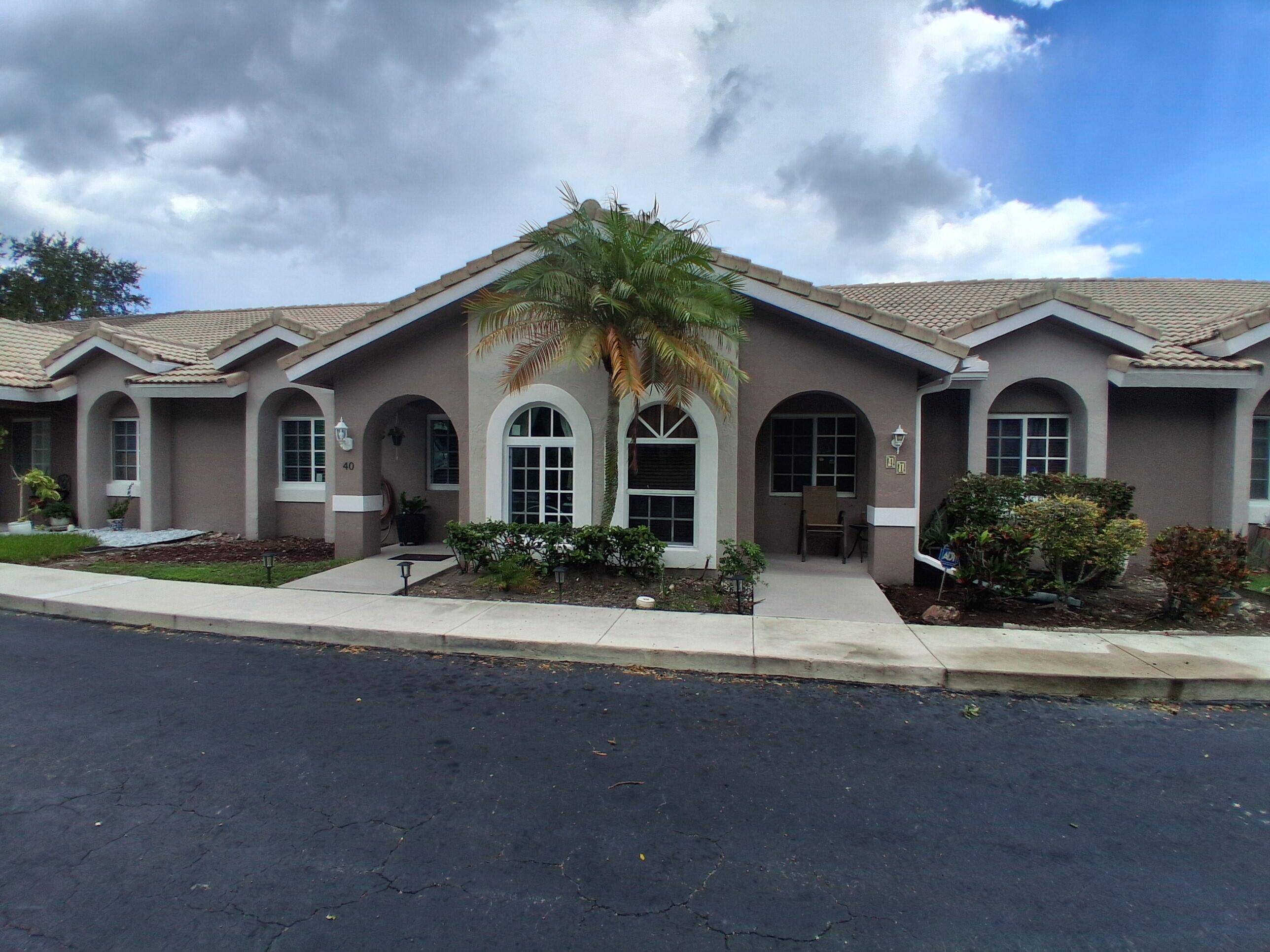 This lovely villa style condo is in good condition, featuring tile floors throughout.