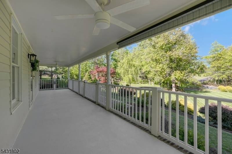 Set on 1. 6 private acres of mature, landscaped grounds, this updated Colonial pairs a bright, light filled interior with a yard built for outdoor living.