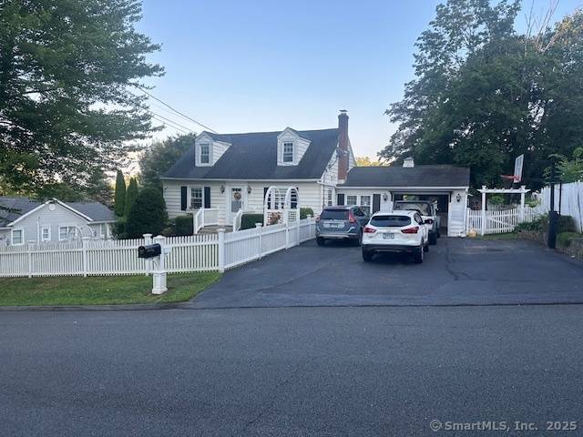 Desirable location, well maintained and spacious Cape Cod Style home.
