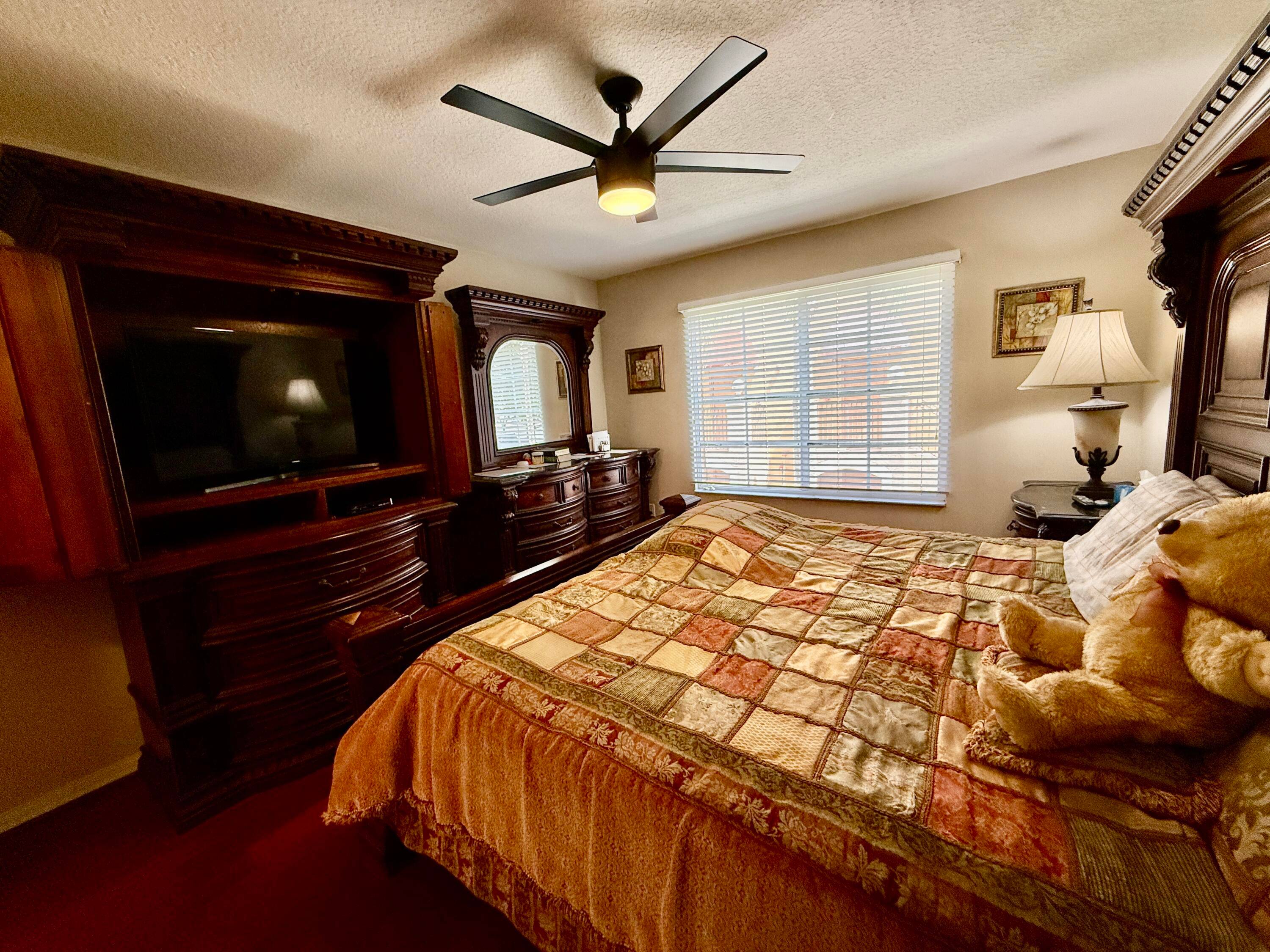 Beautifully updated 3BR 2BA second floor condo with over 1, 300 sq ft at Emerald Isle at Lakes gated community in West Palm Beach.