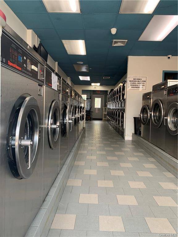 Here We Have a Semi Attached Laundromat on Grand ave in a high traffic area.