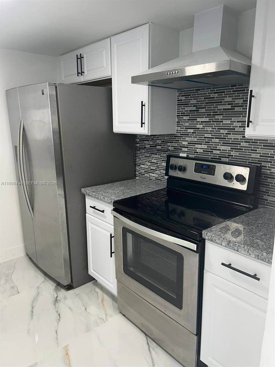 Remodeled Home ! New Floor, New Kitchen, New Bathroom !