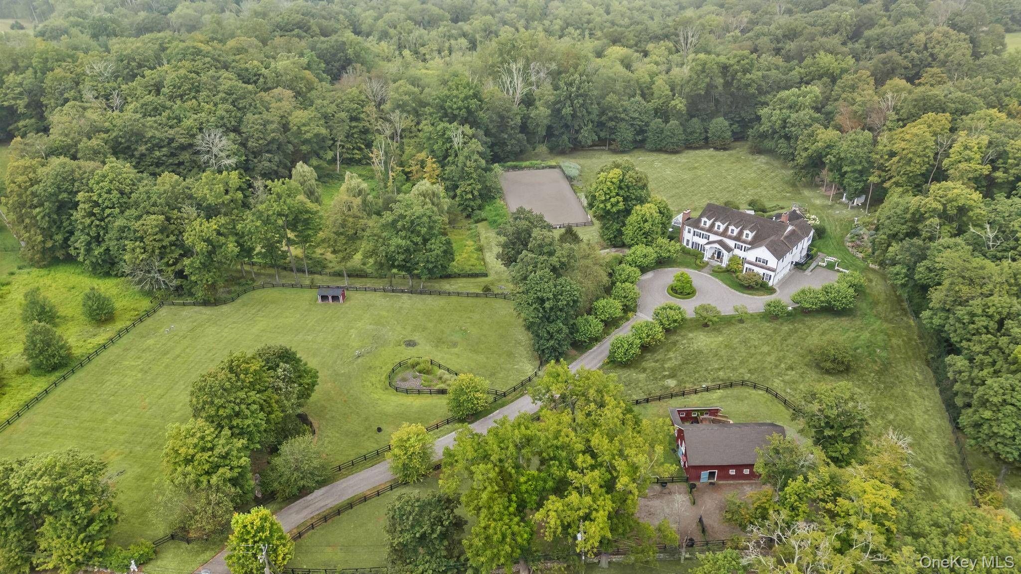 Olympic Hill Farm A rare and remarkable estate nestled on 20 breathtaking acres in the heart of historic Guard Hill.