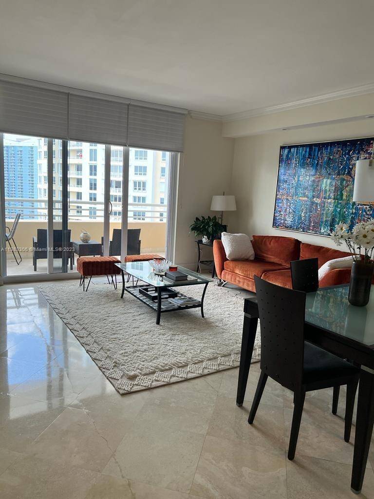 SPACIOUS 1 BEDROOM, 1. 5 BATH IN EXCLUSIVE GATED BRICKELL KEY.