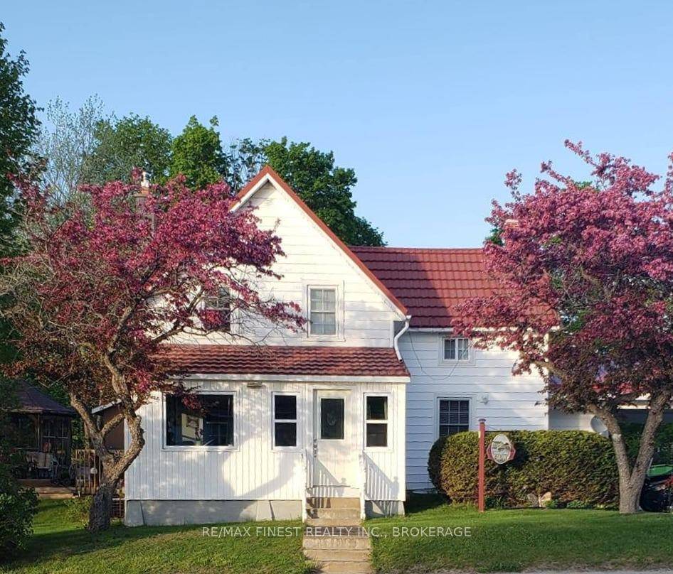 Welcome to this charming year round waterfront home on Sharbot Lake.