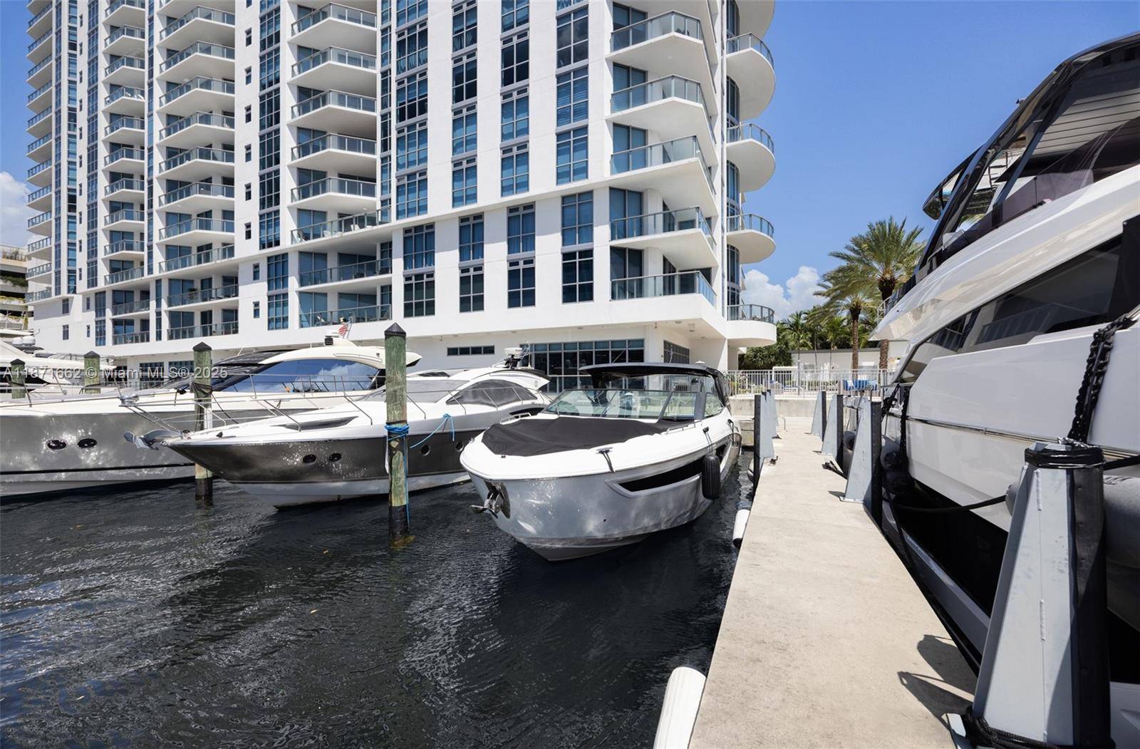BOAT SLIP INCLUDED ! Residence 2009 at Marina Palms is a high floor southeast corner home with 3 bedrooms, 3.