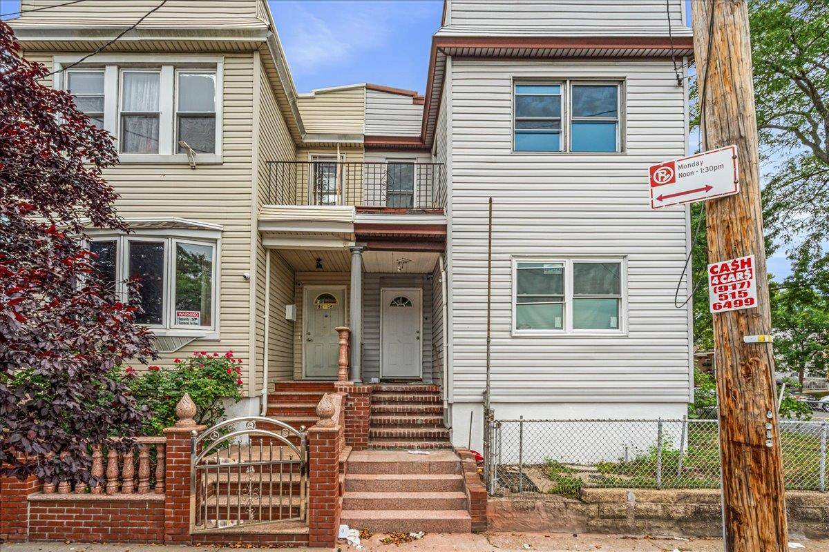 Fully Renovated 2 Family Corner Property.