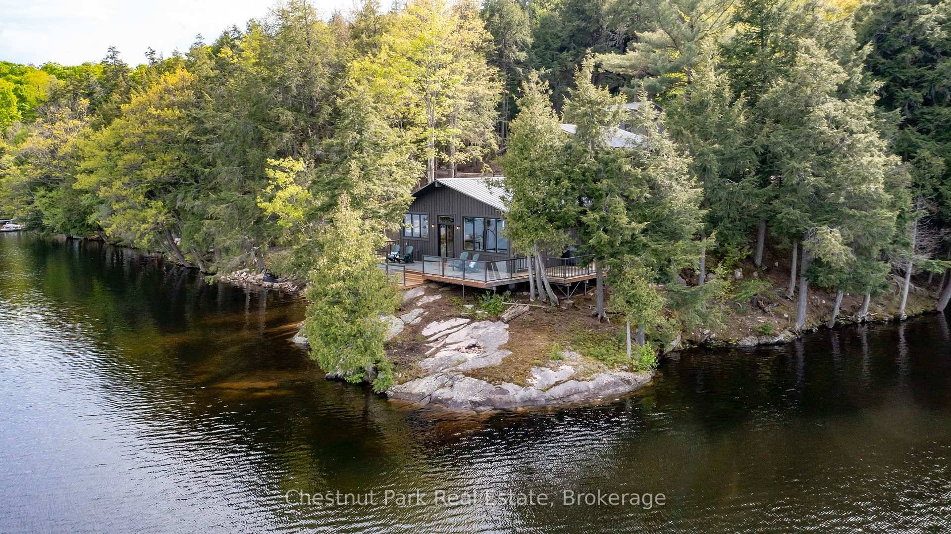 OPEN HOUSE SATURDAY, MAY 31ST 1PM TO 3PM Fully furnished and perfectly positioned on a private 5 acre point with an incredible 600 feet of pristine shoreline, this exceptional 4 ...