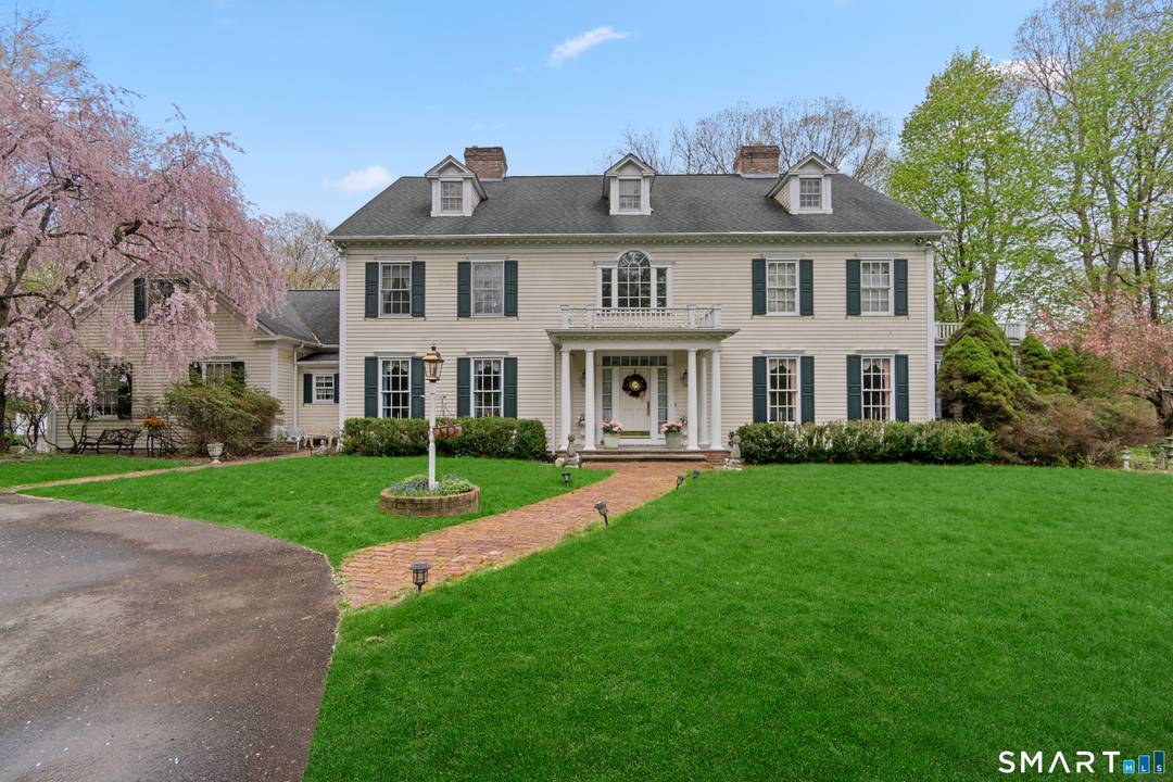 Experience luxury living in this exquisite Garceau built colonial, nestled on a sprawling 2.